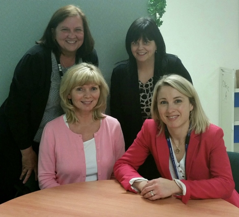 The clinical trials team. Sitting, (l-r): Gail House and Elysia Desai. Standing, (l-r): Elizabeth (Liz) Fuller and Lorilee Noel