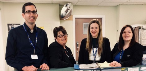 A clinical pharmacist consults with other health providers on the vascular surgery unit at St. Clare’s Mercy Hospital. (L-r): Darryl Burke, vascular clinical pharmacist; Lorie Dinn, vascular nurse practitioner; Heather Williams, pharmacist resident; and Kara Ryan, vascular nurse practitioner with Eastern Health